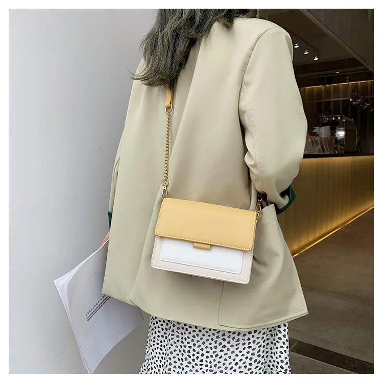 Sac à bandoulière en cuir PU tendance avec chaîne et pochette mode